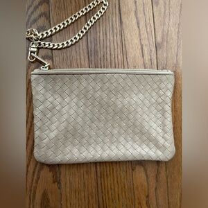 Cole Haan Wristlet. Weaved Front, 100% leather exterior, unbranded strap.